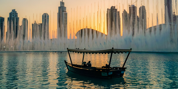     boat lake ride during fountain show Burj Khalifa Dubai
